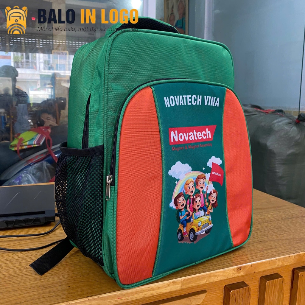 balo-hoc-sinh-in-logo-vai-900pu-xanh-la-phoi-cam-hoa-tiet-hoat-hinh-hs-11 (3) balo-hoc-sinh-in-logo-vai-900pu-xanh-la-phoi-cam-hoa-tiet-hoat-hinh-hs-11