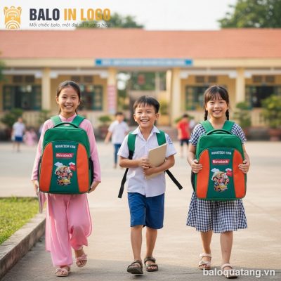 Balo học sinh in logo vải 900PU xanh lá phối cam họa tiết hoạt hình HS-11