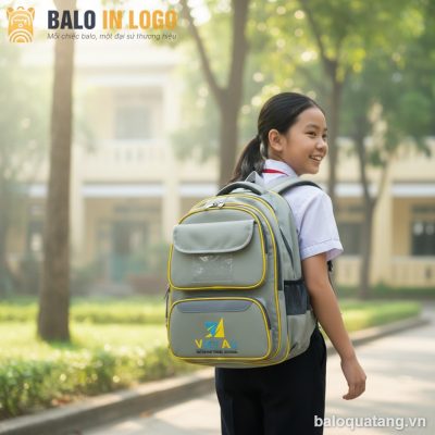 Balo học sinh quà tặng in logo vải 900PU 30x40x12cm màu xám vàng HS-10